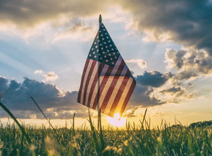 flag of USA on grass field