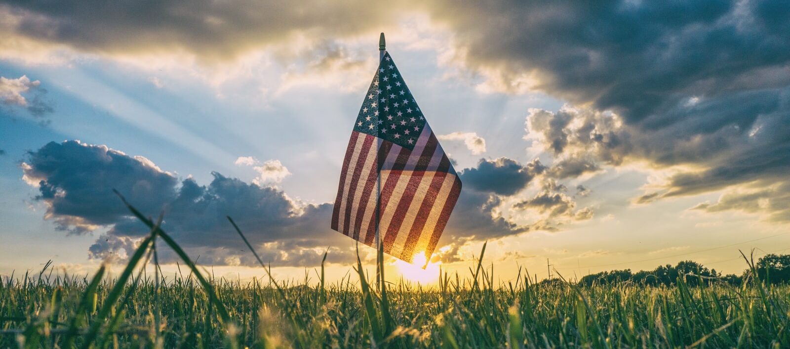 flag of USA on grass field