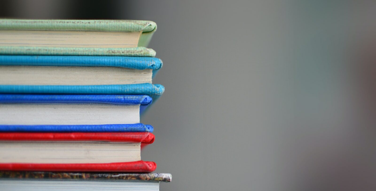 shallow focus photography of books