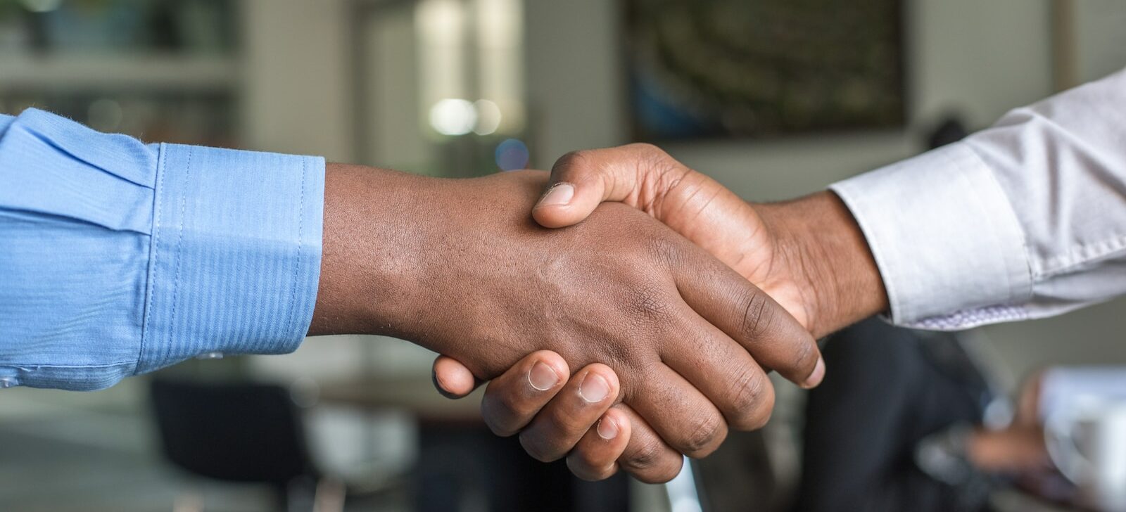 two people shaking hands